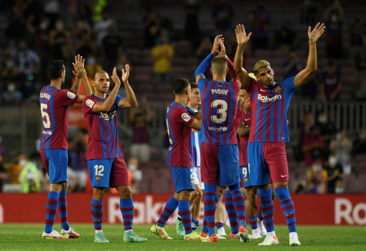 Barcelona players celebrate after beating Real Sociedad last weekend