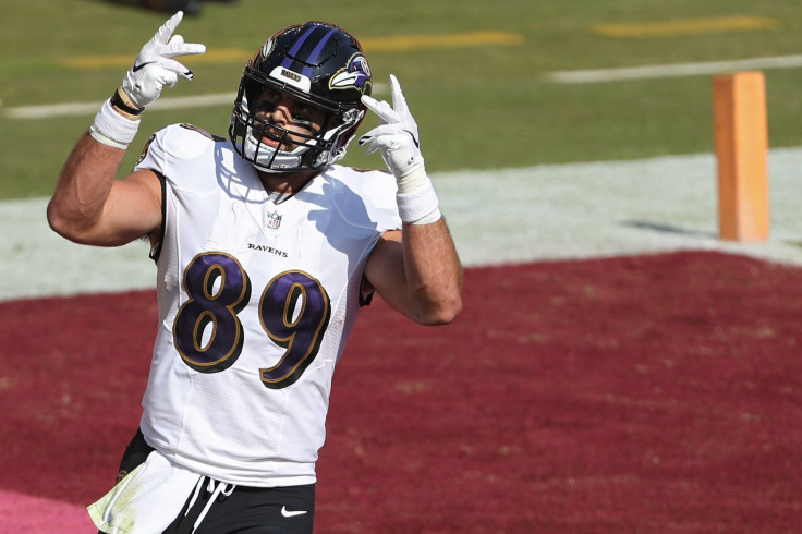 Tight end Mark Andrews #89 of the Baltimore Ravens celebrates his second touchdown of the game against the Washington Football Team during the third quarter at FedExField on October 4, 2020 in Landover, Maryland. Due to the coronavirus pandemic, the Washi