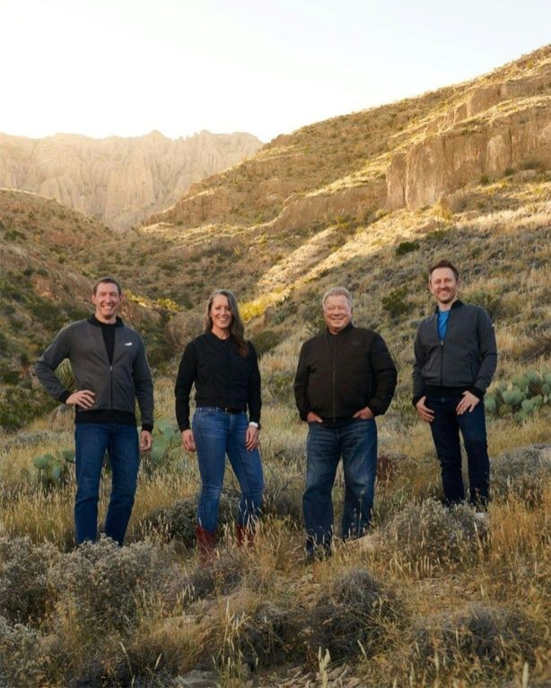 The crew, (from R) Chris Boshuizen, Canadian actor William Shatner, Audrey Powers and Glen de Vries, will hop just beyond Earth's atmosphere