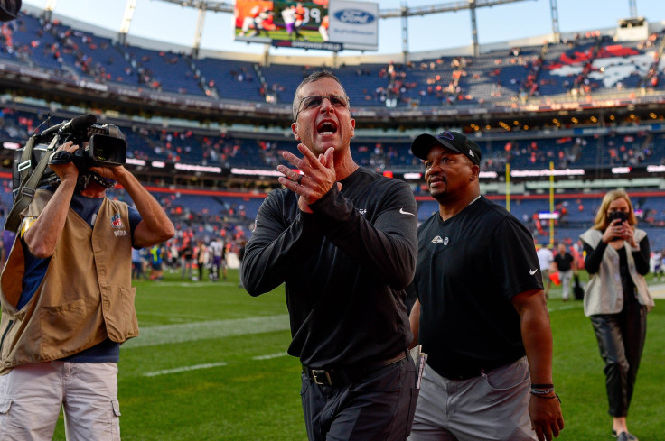 Head coach John Harbaugh of the Baltimore Ravens walks off the field after a 23-7 win over the Denver Broncos at Empower Field at Mile High on October 3, 2021 in Denver, Colorado.