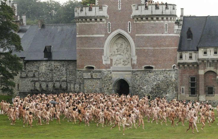 Naked volunteers pose for U.S. artist Spencer Tunick in Gaasbeek