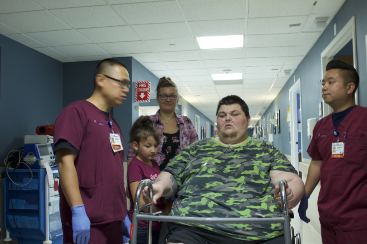 "My 600-LB Life" Season 7 star Cillas is pictured receiving assistance in the hospital hall.