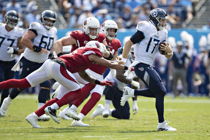 Ryan Tannehill #17 of the Tennessee Titans runs the ball during the game against the Arizona Cardinals at Nissan Stadium on September 12, 2021 in Nashville, Tennessee. The Cardinals defeated the Titans 38-13.