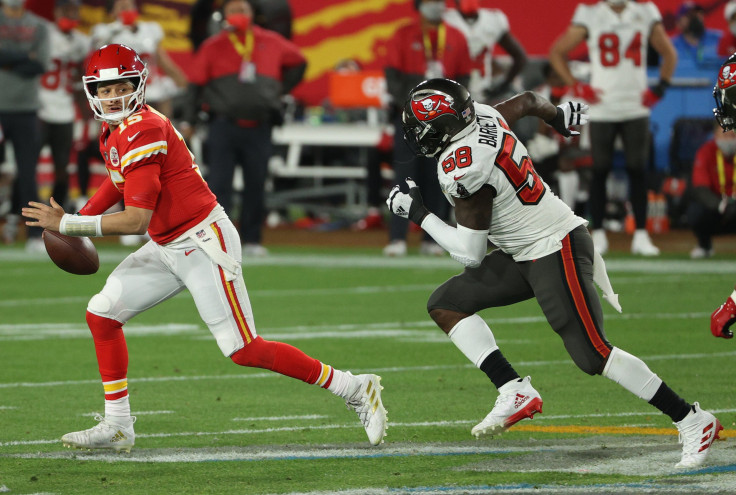Patrick Mahomes #15 of the Kansas City Chiefs looks to pass against Shaquil Barrett #58 of the Tampa Bay Buccaneers in Super Bowl LV at Raymond James Stadium on February 07, 2021 in Tampa, Florida.