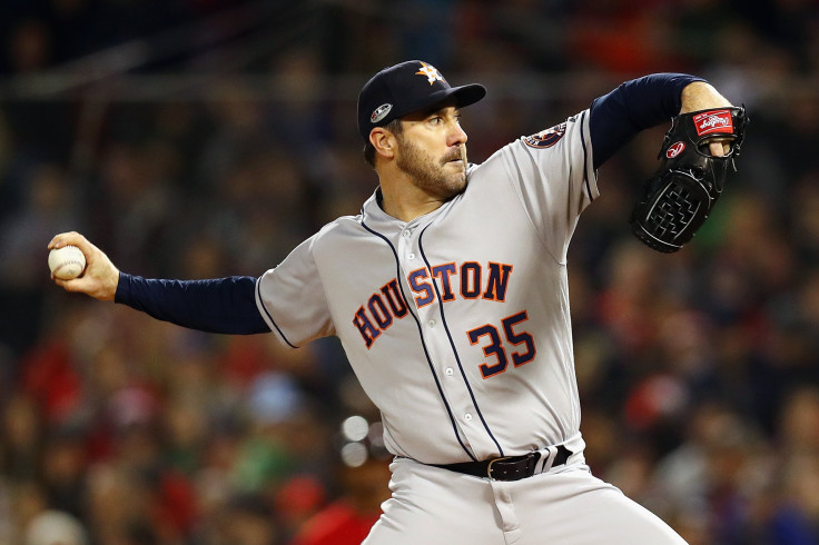 Justin Verlander #35 of the Houston Astros pitches against the Boston Red Sox during Game One of the American League Championship Series at Fenway Park on October 13, 2018 in Boston, Massachusetts.