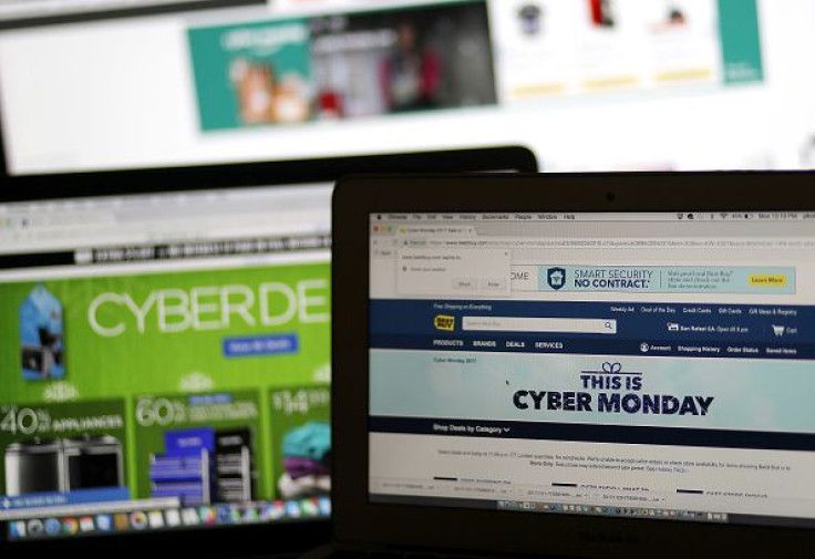 In this photo illustration, an ad seen on the Best Buy website for a Cyber Monday sale is displayed on laptop computers on Nov. 27, 2017, in San Anselmo, California. 