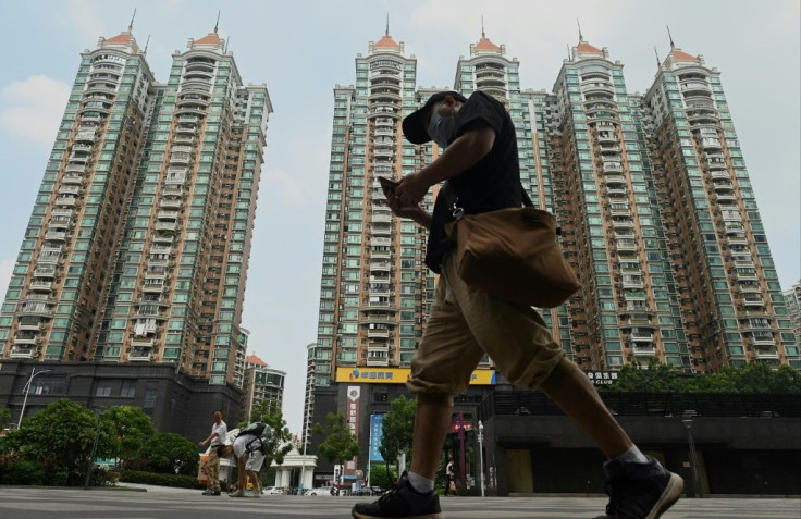 China's soaring home prices is one of the consequences of government policies that promote the development of "ghost cities."