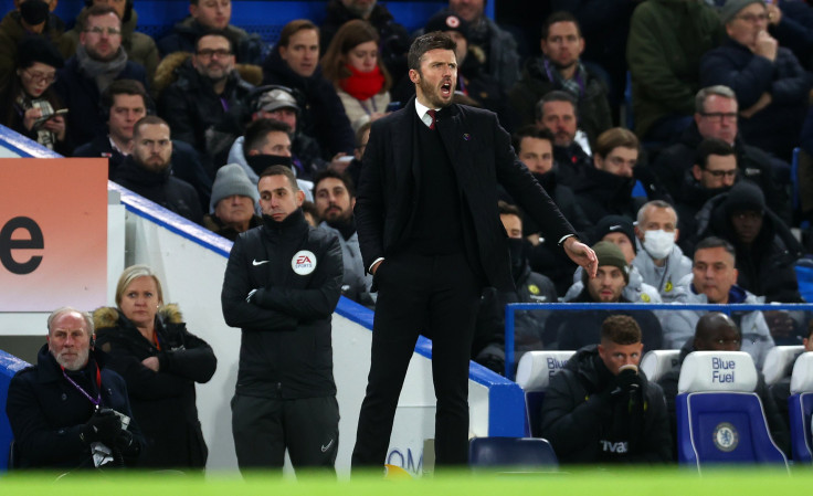 Michael Carrick, Interim Manager of Manchester United, gestures during the Premier League match between Chelsea and Manchester United at Stamford Bridge on November 28, 2021 in London, England.