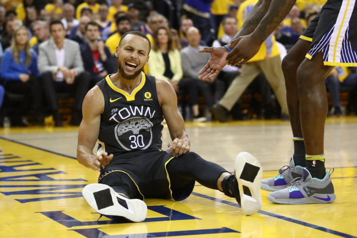 Stephen Curry #30 of the Golden State Warriors reacts after a play during Game 4 of the Western Conference Finals of the 2018 NBA Playoffs against the Houston Rockets at ORACLE Arena on May 22, 2018 in Oakland, California.