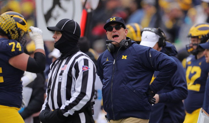 Michigan Wolverines Head Football Coach Jim Harbaugh reacts to a call during the second quarter of the game against the Ohio State Buckeyes at Michigan Stadium on November 30, 2019 in Ann Arbor, Michigan. Ohio State defeated Michigan 56-27. 