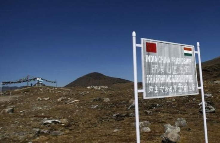 A signboard is seen from the Indian side of the Indo-China border at Bumla, in Arunachal Pradesh.