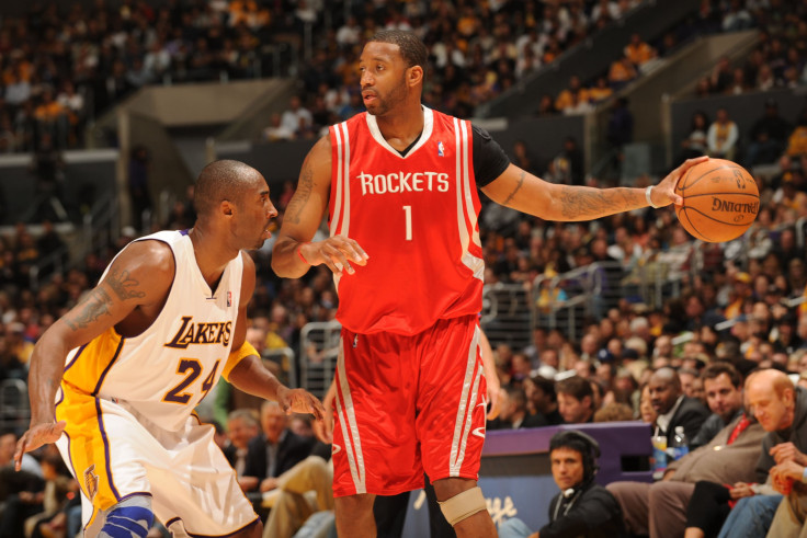 Kobe Bryant of the Los Angeles Lakers guards Tracy McGrady of the Houston Rockets during an NBA game in 2008.