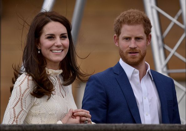 Kate Middleton and Prince Harry host a tea party at Buckingham Palace to honor the children of those who have died serving in the armed forces on May 13, 2017 in London, England.