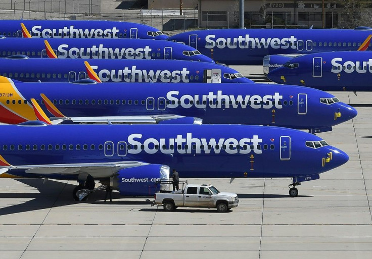 These Southwest Airlines planes, seen on a tarmac in California, were among the Boeing 737 MAX aircraft grounded after two fatal crashes; Boeing now hopes the model will be cleared to fly in January 2020, while some airlines are aiming for March