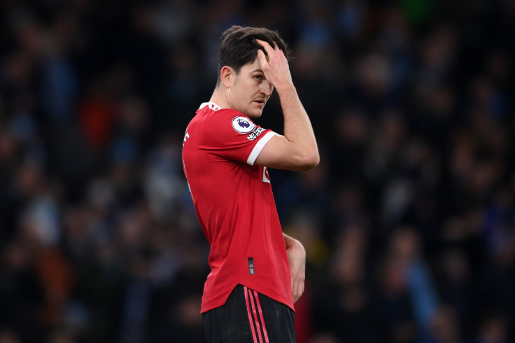 Harry Maguire of Manchester United looks dejected during the Premier League match between Manchester City and Manchester United at Etihad Stadium on March 06, 2022 in Manchester, England.