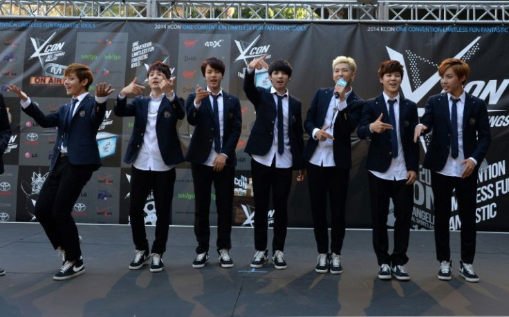 BTS, all in their 20s and often sporting earrings and lipstick, appeal to a generation comfortable with gender fluidity