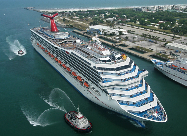 In this photo, escorted by water-squirting tugs, the new Carnival Glory arrives in Cape Canaveral, Florida, on July 11, 2003.
