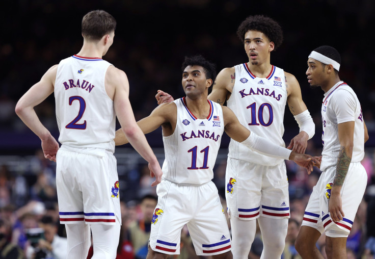 L-R Christian Braun #2, Remy Martin #11, Jalen Wilson #10 and Dajuan Harris Jr. #3 of the Kansas Jayhawks react in the second half of the game against the Villanova Wildcats during the 2022 NCAA Men's Basketball Tournament Final Four semifinal at Caesars 