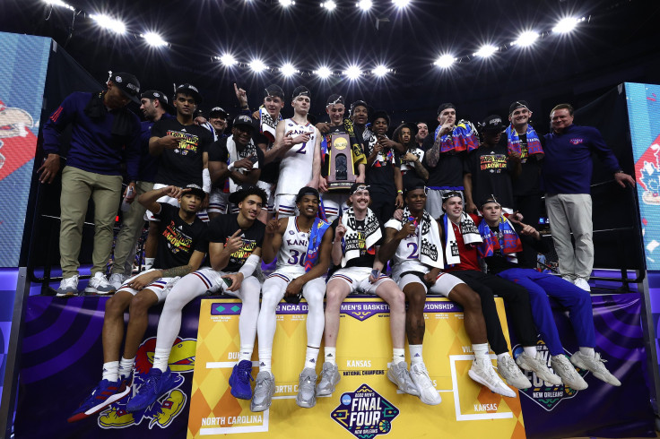 The Kansas Jayhawks pose for a picture after defeating the North Carolina Tar Heels 72-69 during the 2022 NCAA Men's Basketball Tournament National Championship at Caesars Superdome on April 04, 2022 in New Orleans, Louisiana.