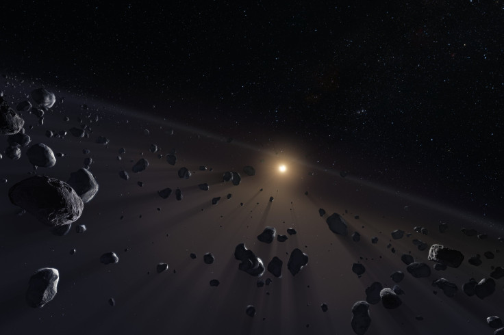 Beyond Neptune, there is a large disc of small objects, called the Kuiper Belt. This artwork shows a section of Kuiper Belt, crowded with the icy cores of potential comets.
