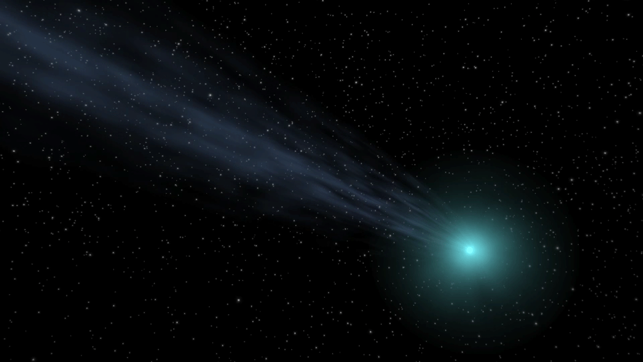 This illustration of a comet shows the atmosphere of dust and gas, known as a coma, and the long tail streaming out behind it.