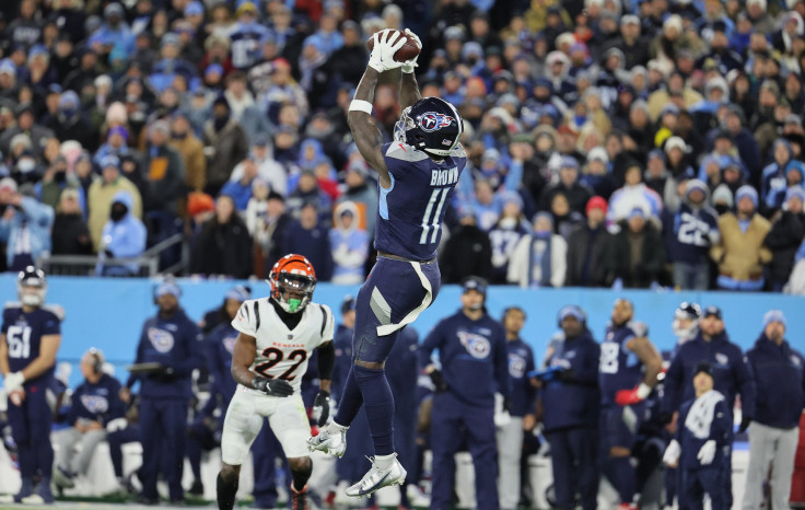 A.J. Brown #11 of the Tennessee Titans catches a pass against the Cincinnati Bengals during the AFC Divisional Playoff at Nissan Stadium on January 22, 2022 in Nashville, Tennessee. 