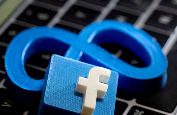 3D-printed images of the logos of Facebook and parent company Meta Platforms are seen on a laptop keyboard in this illustration taken on November 2, 2021. 