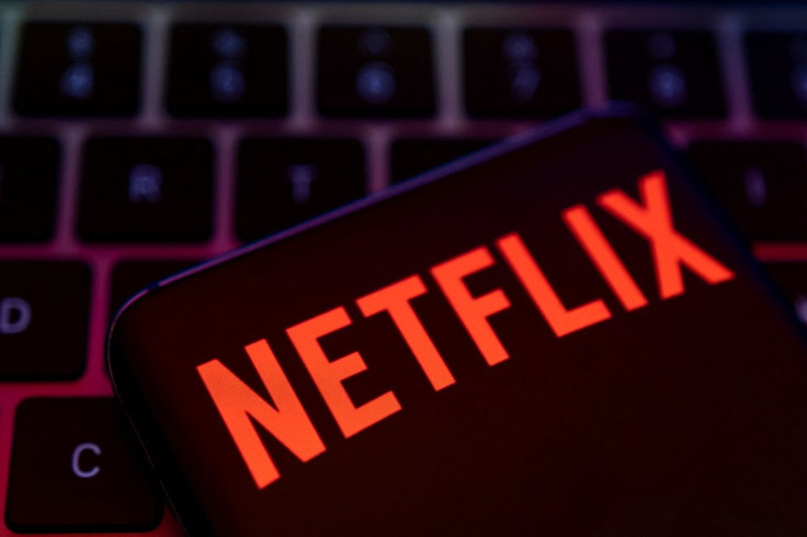 Smartphone with Netflix logo is placed on a keyboard in this illustration taken April 19, 2022.