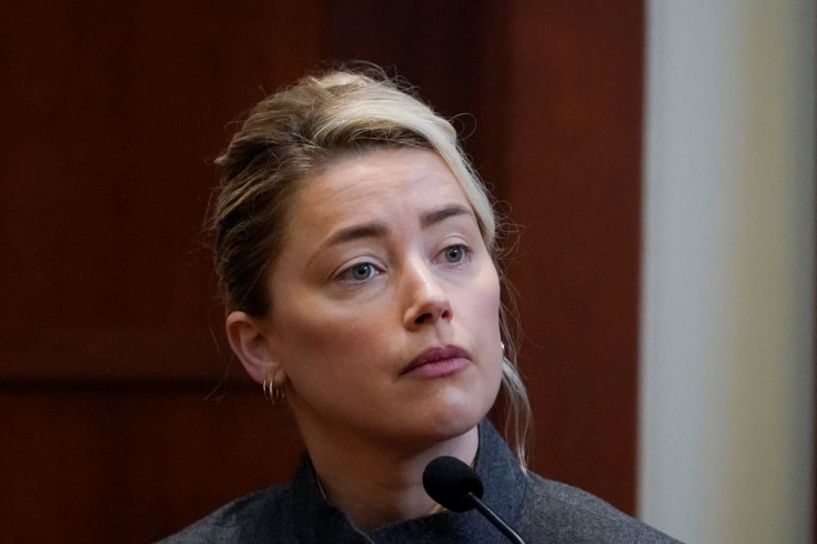 Actor Amber Heard testifies in the courtroom at the Fairfax County Circuit Courthouse in Fairfax, Virginia, U.S., May 16, 2022. Steve Helber/Pool via REUTERS