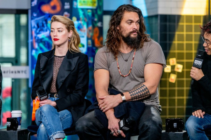 NEW YORK, NEW YORK - DECEMBER 03: Amber Heard and Jason Momoa discuss "Aquaman" with the Build Series at Build Studio on December 03, 2018 in New York City.