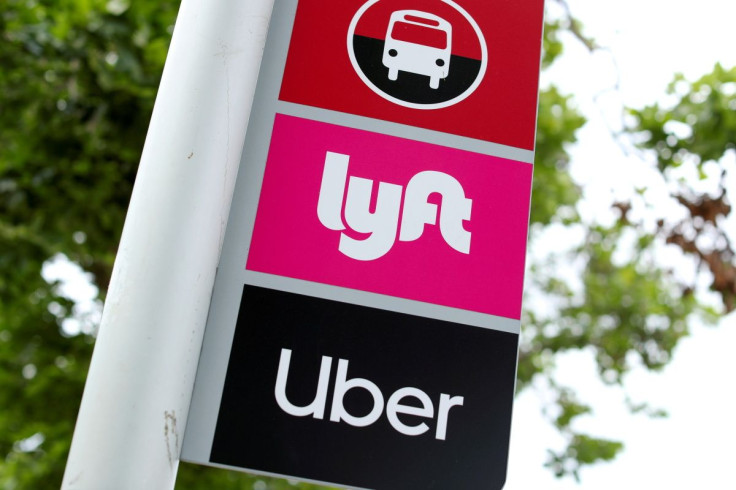 A sign marks a rendezvous location for Lyft and Uber users in San Diego on May 13, 2020.      