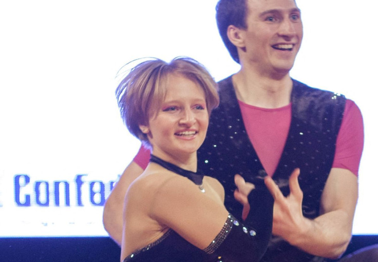 Katerina Tikhonova (L), daughter of Russian President Vladimir Putin, dances with Ivan Klimov during the World Cup Rock'n'Roll Acrobatic Competition in Krakow, Poland, in this April 12, 2014.