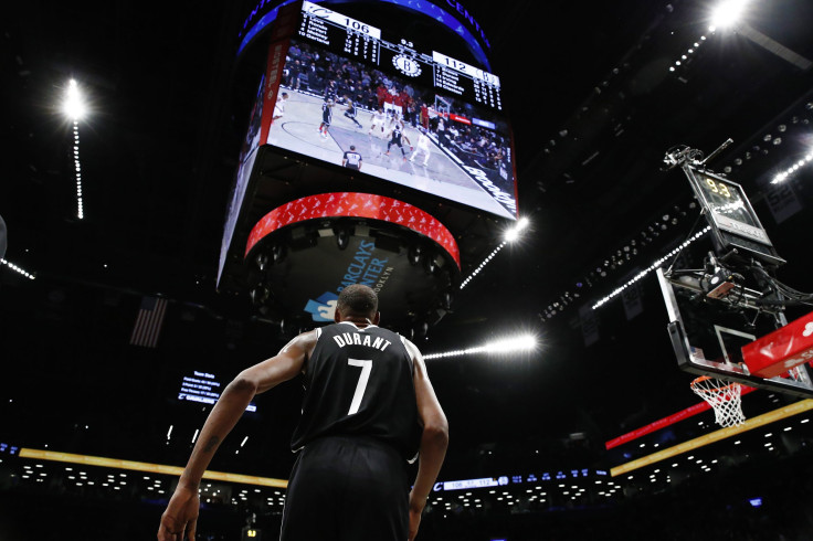 Kevin Durant #7 of the Brooklyn Nets looks on during the second half of the Eastern Conference 2022 Play-In Tournament against the Cleveland Cavaliers at Barclays Center on April 12, 2022 in the Brooklyn borough of New York City. The Nets won 115-108.