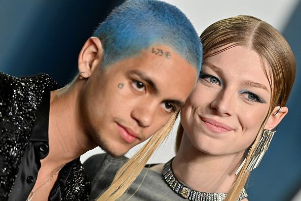 Pictured: Dominic Fike and Hunter Schafer attend the 2022 Vanity Fair Oscar Party hosted by Radhika Jones at Wallis Annenberg Center for the Performing Arts on March 27, 2022 in Beverly Hills, California.