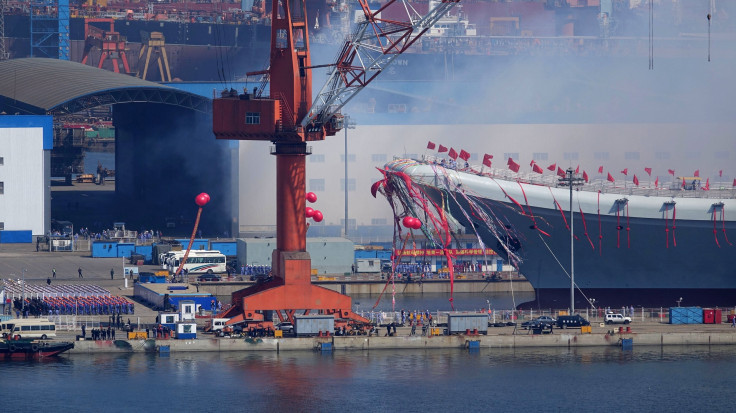 File image of China's second aircraft carrier, Shandong, being transferred from the dry dock into the water 