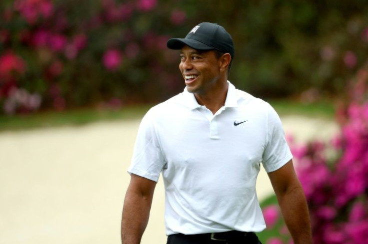 Five-time champion Tiger Woods plays a practice round before the 86th Masters at Augusta National Golf Club