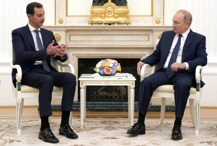 Russian President Vladimir Putin attends a meeting with Syrian President Bashar al-Assad at the Kremlin in Moscow, Russia, September 13, 2021. Sputnik/Mikhail Klimentyev/Kremlin via REUTERS  