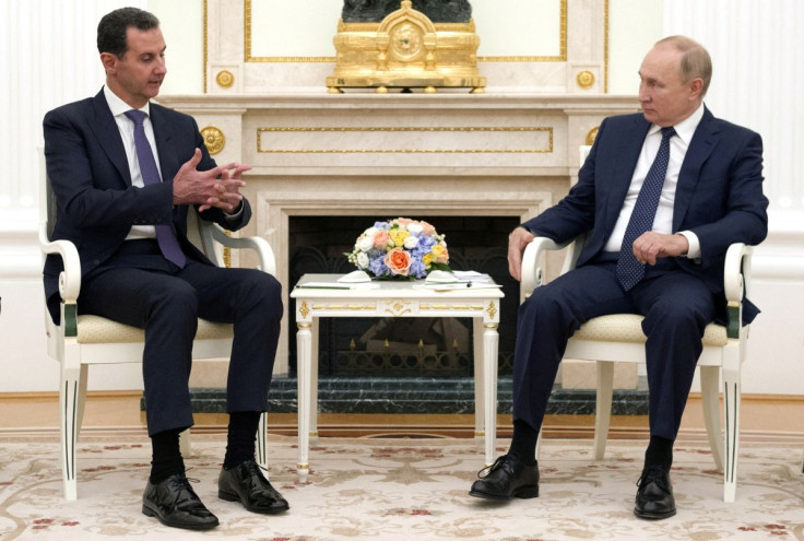Russian President Vladimir Putin attends a meeting with Syrian President Bashar al-Assad at the Kremlin in Moscow, Russia, September 13, 2021. Sputnik/Mikhail Klimentyev/Kremlin via REUTERS