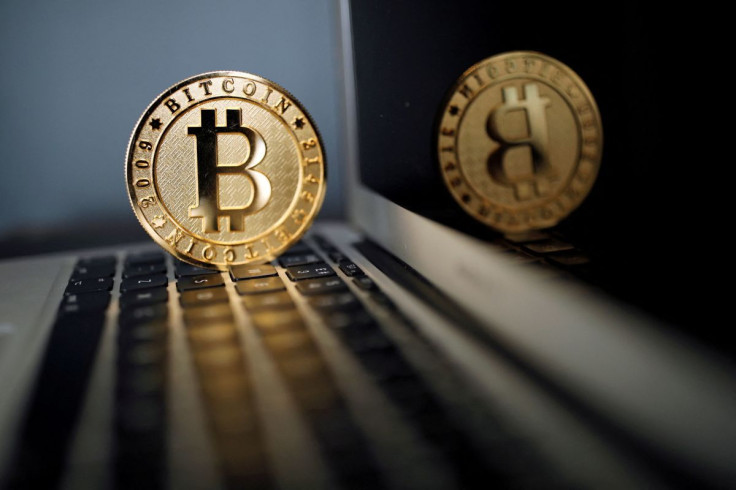 A bitcoin representation is seen in an illustration picture taken at La Maison du Bitcoin in Paris, France, June 23, 2017.