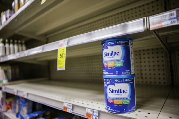 Shelves normally meant for baby formula sit nearly empty at a store in downtown Washington, DC, on May 22, 2022