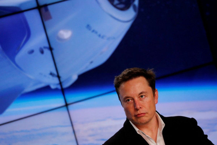 SpaceX founder Elon Musk speaks at a post-launch press conference after the SpaceX Falcon 9 rocket, carrying the Crew Dragon spacecraft, lifted off on an uncrewed test flight to the International Space Station from the Kennedy Space Center in Cape Canaver