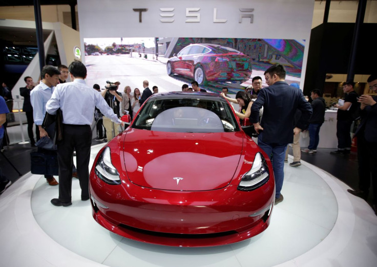 Germany's KBA wants Tesla to recall thousands of Model Y and Model 3 units. In photo: a Tesla Model 3 car is displayed during a media preview at the Auto China 2018 motor show in Beijing, China April 25, 2018. 