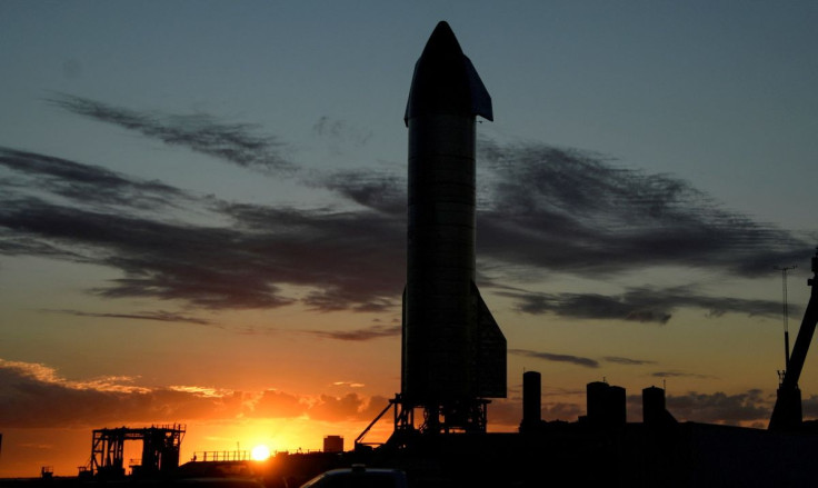 The sun sets as SpaceX prepares their super heavy-lift Starship SN8 rocket for a test launch this week at the company's facilities in Boca Chica, Texas, U.S. December 1, 2020.