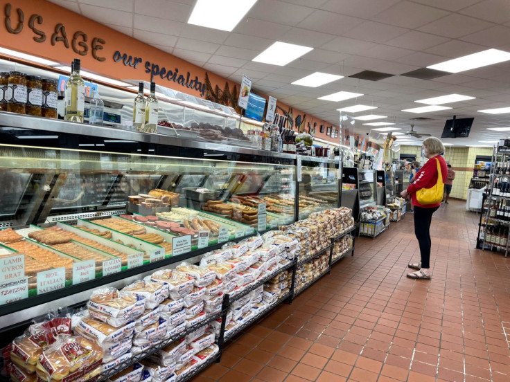 A customer browses meat selections and waits to be serviced at Paulina Meat Market in Chicago, Illinois, U.S., June 28, 2022.
