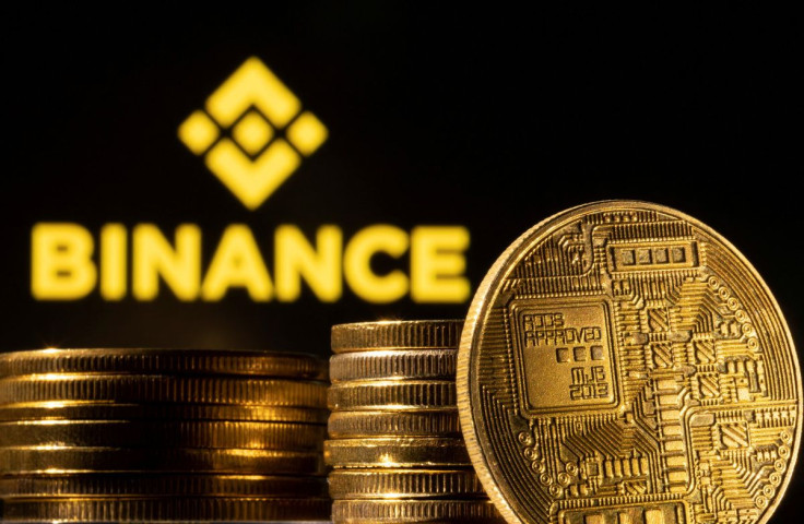 A representation of cryptocurrency is seen in front of Binance logo in this illustration taken, March 4, 2022.