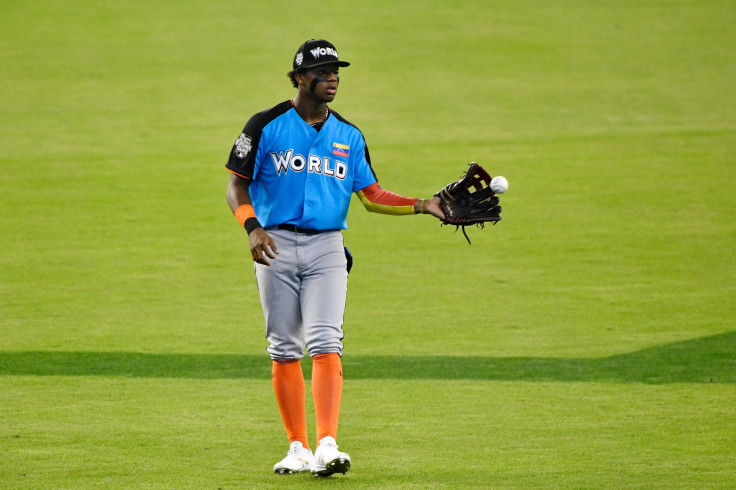Ronald Acuna #24 of the Atlanta Braves and the World Team warms up prior to the SiriusXM All-Star Futures Game at Marlins Park on July 9, 2017 in Miami.