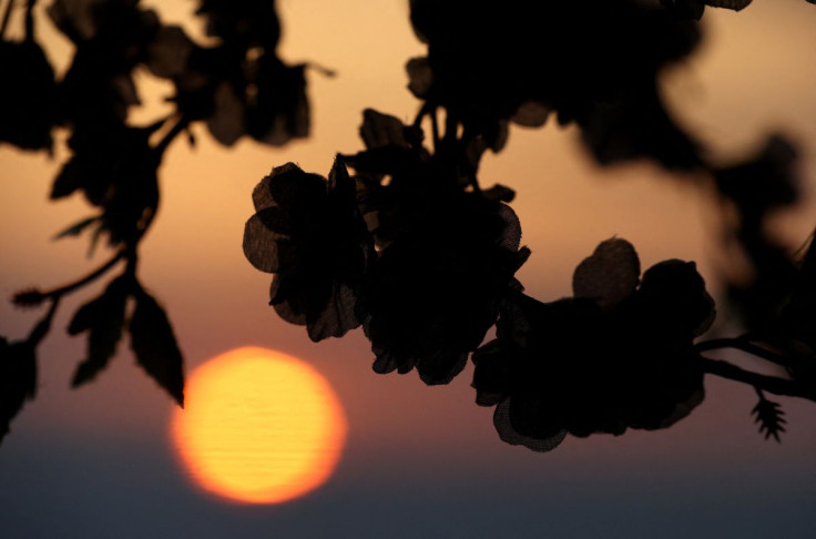 A view of the sunset from Blackpool Tower Garden, during a heatwave, in Blackpool, Britain, July 19, 2022.