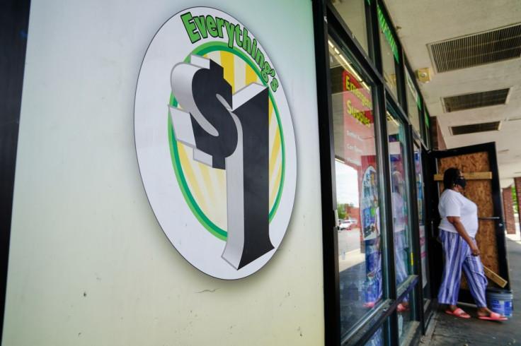 A person exits a Dollar Tree store in Washington, U.S., June 1, 2021.