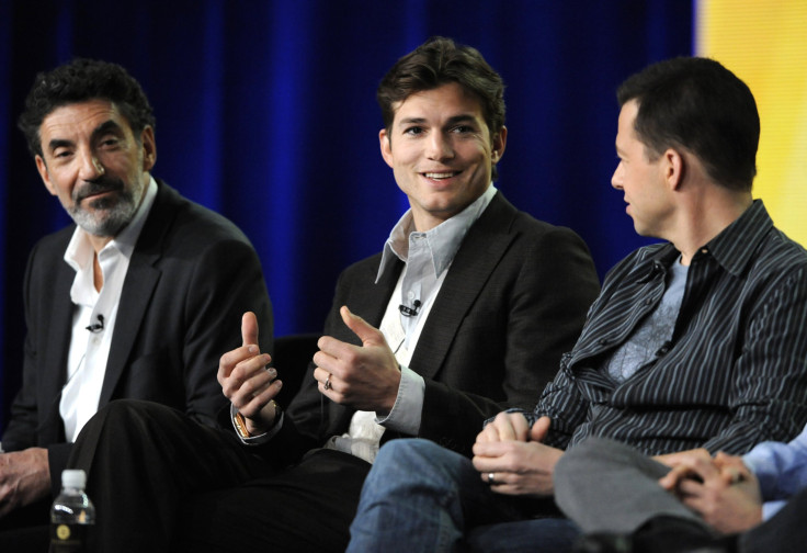 Co-creator and executive producer Chuck Lorre (L) and cast members Ashton Kutcher (C) and Jon Cryer (R) participate in a panel for CBS series "Two and a Half Men" during the CBS sessions at the Television Critics Association winter press tour in Pasadena,