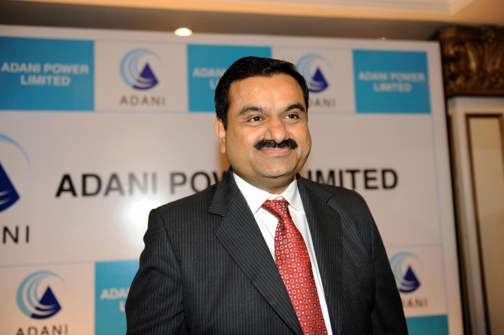 Adani Group Chairman, Gautam Adani smileAdani Group Chairman, Gautam Adani smiles after addressing the media in Ahmedabad on July 21, 2009. Adani spoke about "Adani Power Limited IPO" which opens on July 28. 